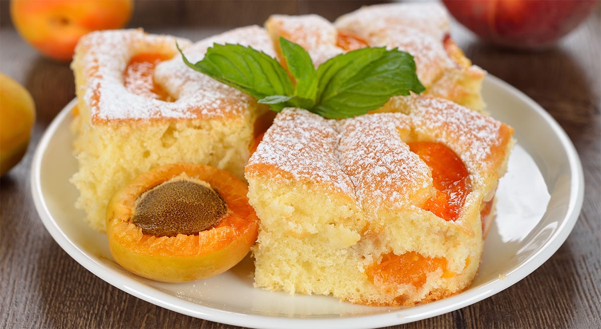 Torta di ricotta, albicocche e succo di arancia